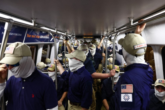 Masked white nationalists march near US Capitol during July 4 celebrations