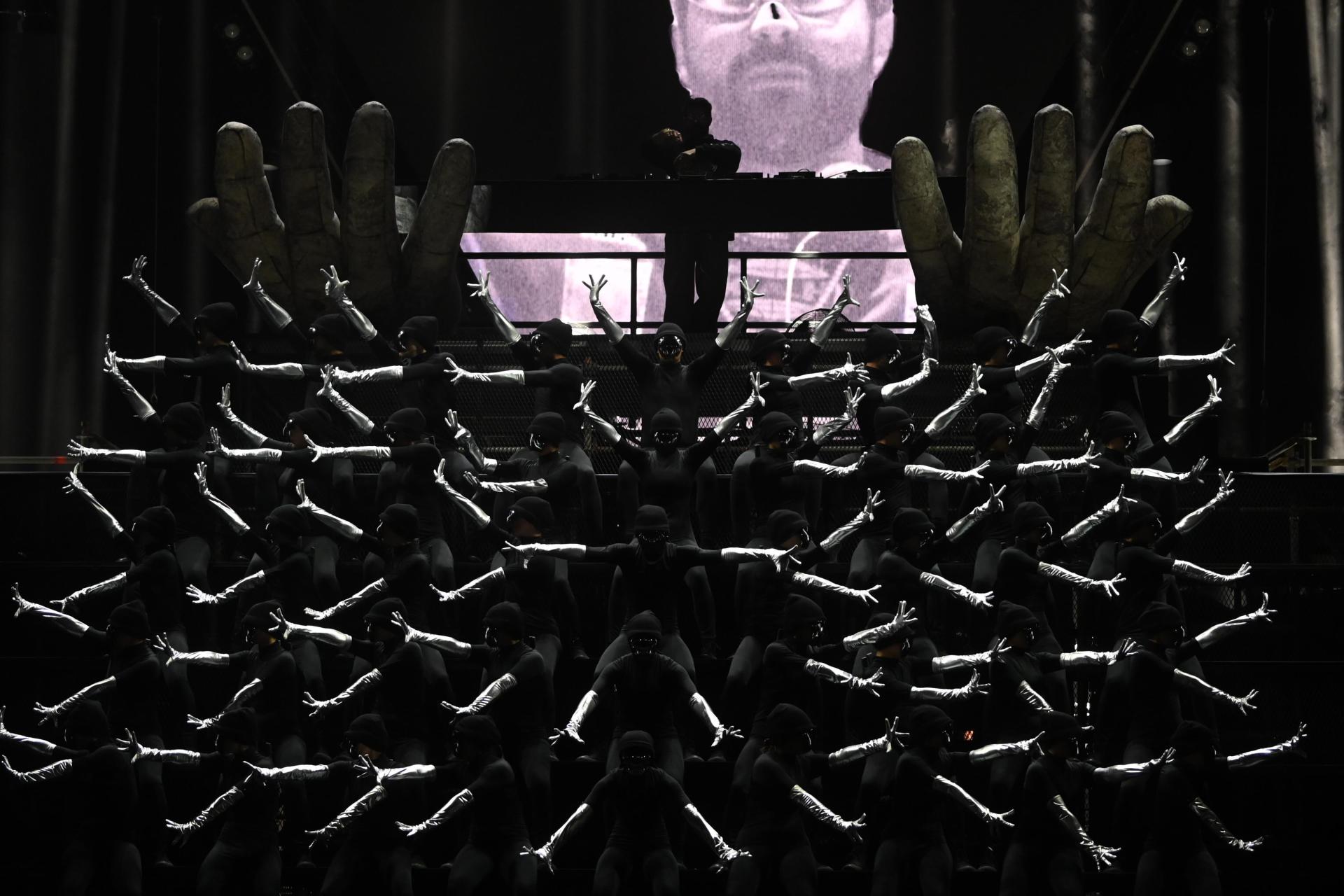 The DJ was supported by a troupe of dancers performing choreographed visual patterns. Photo: Jonathan Borg.