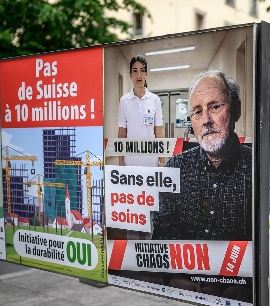 The SVP argues the cap is needed to fight &ldquo;out of control&rdquo; immigration, which it blames for ills like overcrowding, skyrocketing rents and urban sprawl. Photo shows campaign posters for and against the nationwide vote. Photo: Fabrice Coffrini/AFP