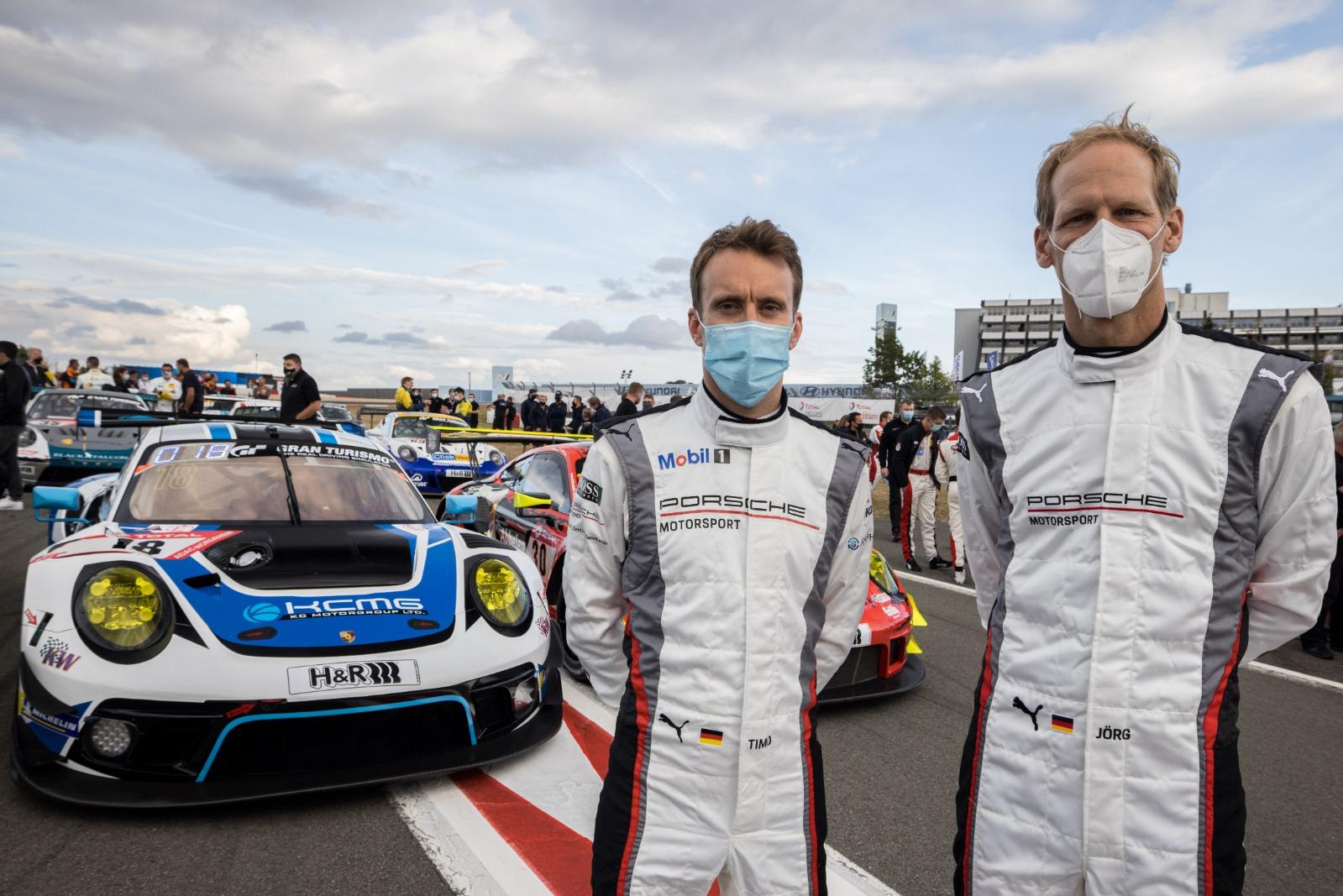 Timo Bernhard and J&ouml;rg Bergmeister.