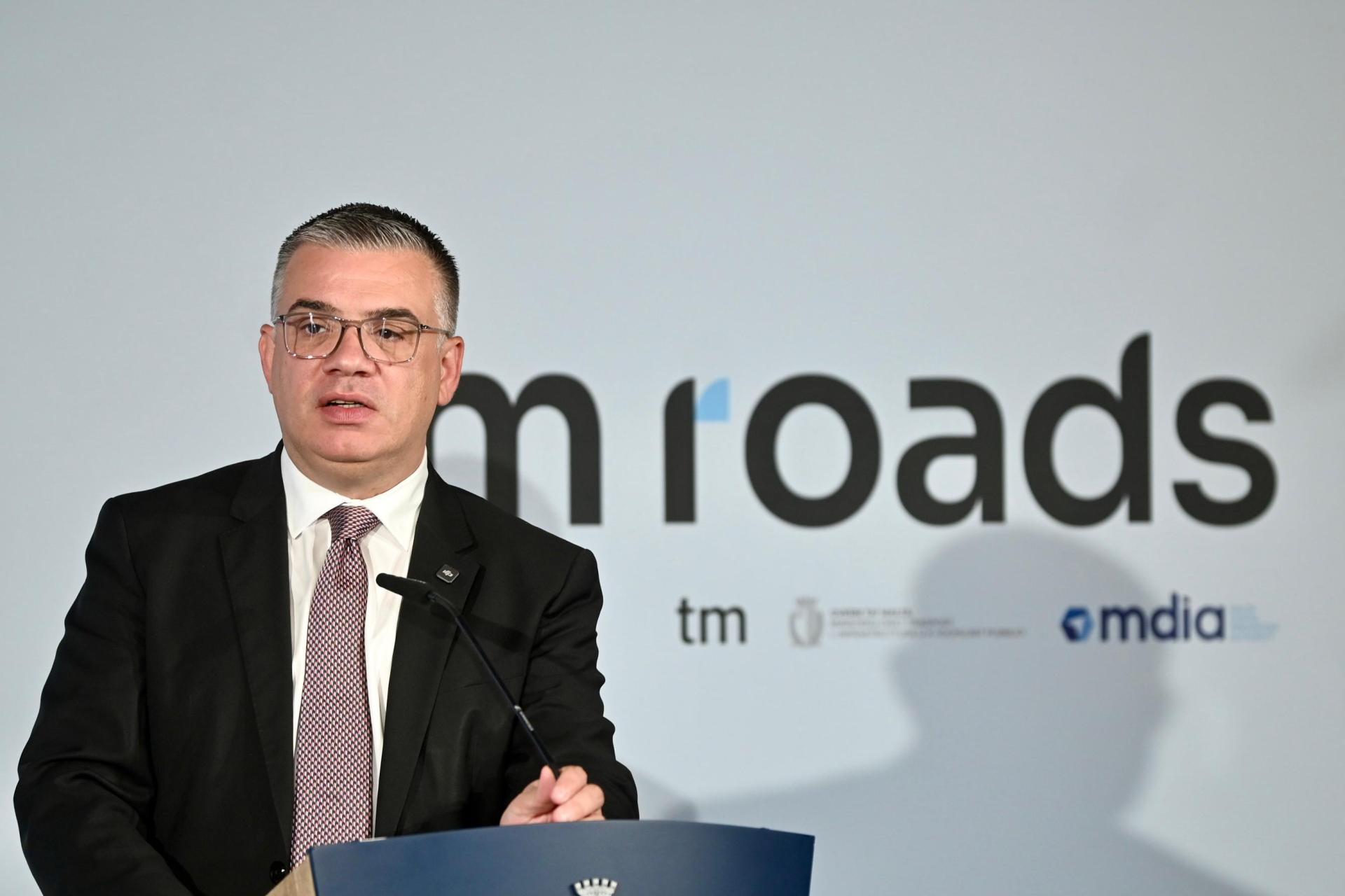 Transport Minister Chris Bonett speaks about the new road works platform.