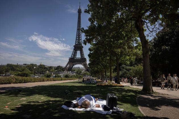 Paris landmarks close early as quarter of France swelters under heatwave