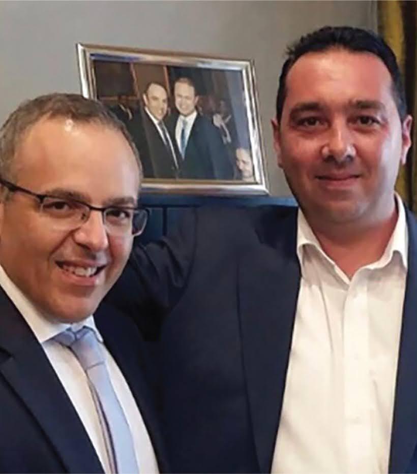 Melvin Theuma, right, with Keith Schembri in a photograph taken in Castille.