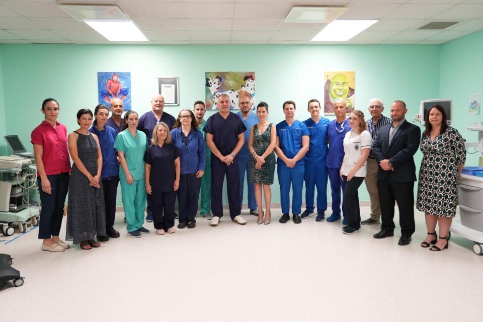 Mater Dei staff and Health Minister Jo Etienne Abela celebrate Malta's first-ever awake brain surgery procedure.