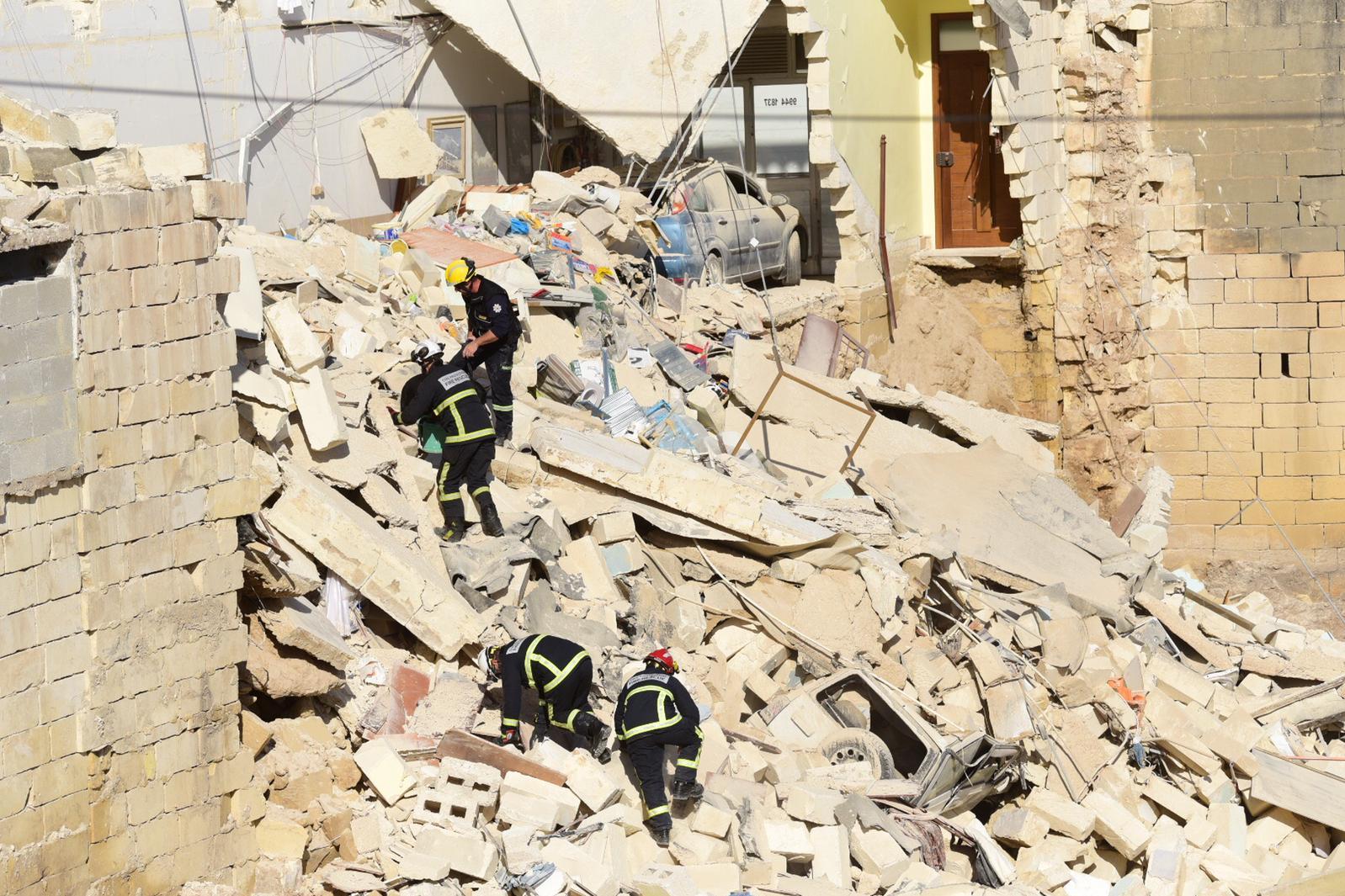 Rescue workers in the rubble on Monday afternoon. Photo: Mark Zammit Cordina&nbsp;