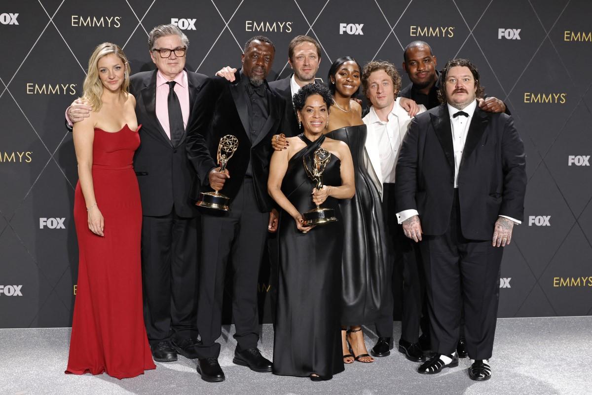 (Left to right) Abby Elliott, Oliver Platt, Edwin Lee Gibson, Ebon Moss-Bachrach, Liza Col&oacute;n-Zayas, Ayo Edebiri, Jeremy Allen White, Lionel Boyce, and Matty Matheson, winners of Outstanding Comedy Series for <em>The Bear</em>.