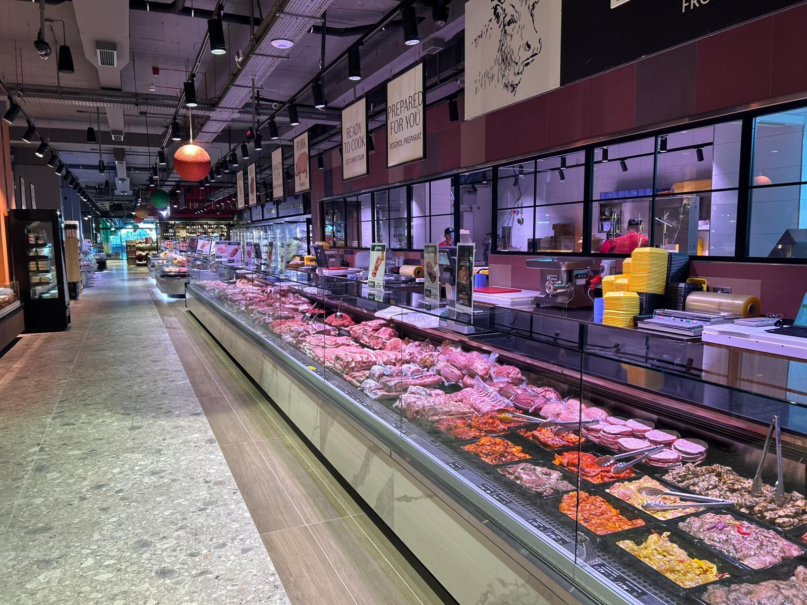 The butcher at Greens Supermarket, Qormi.