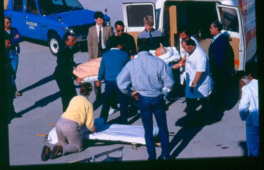 Jackie Pflug being being transported into an ambulance.