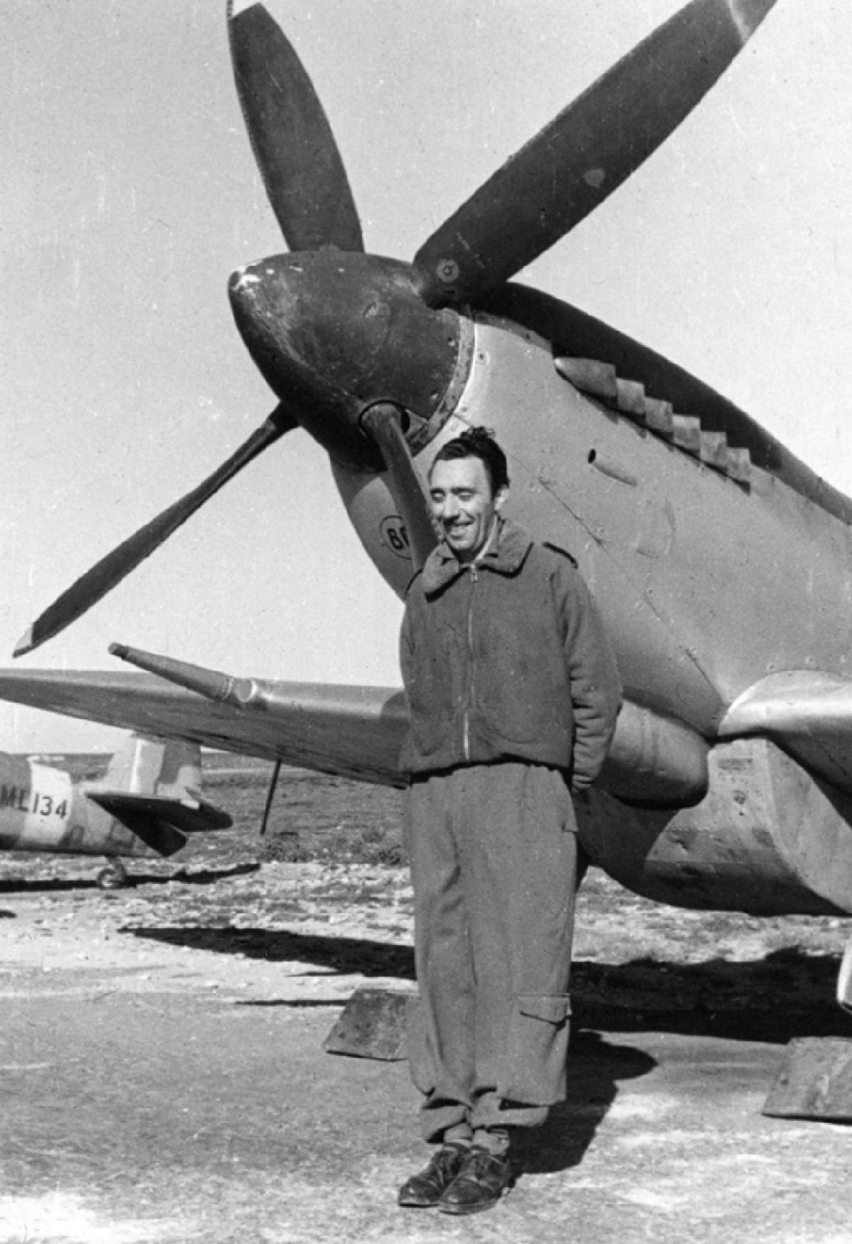 Faliero Gelli, after the war, standing in front a Spitfire Mk. IX of the Italian air force.
