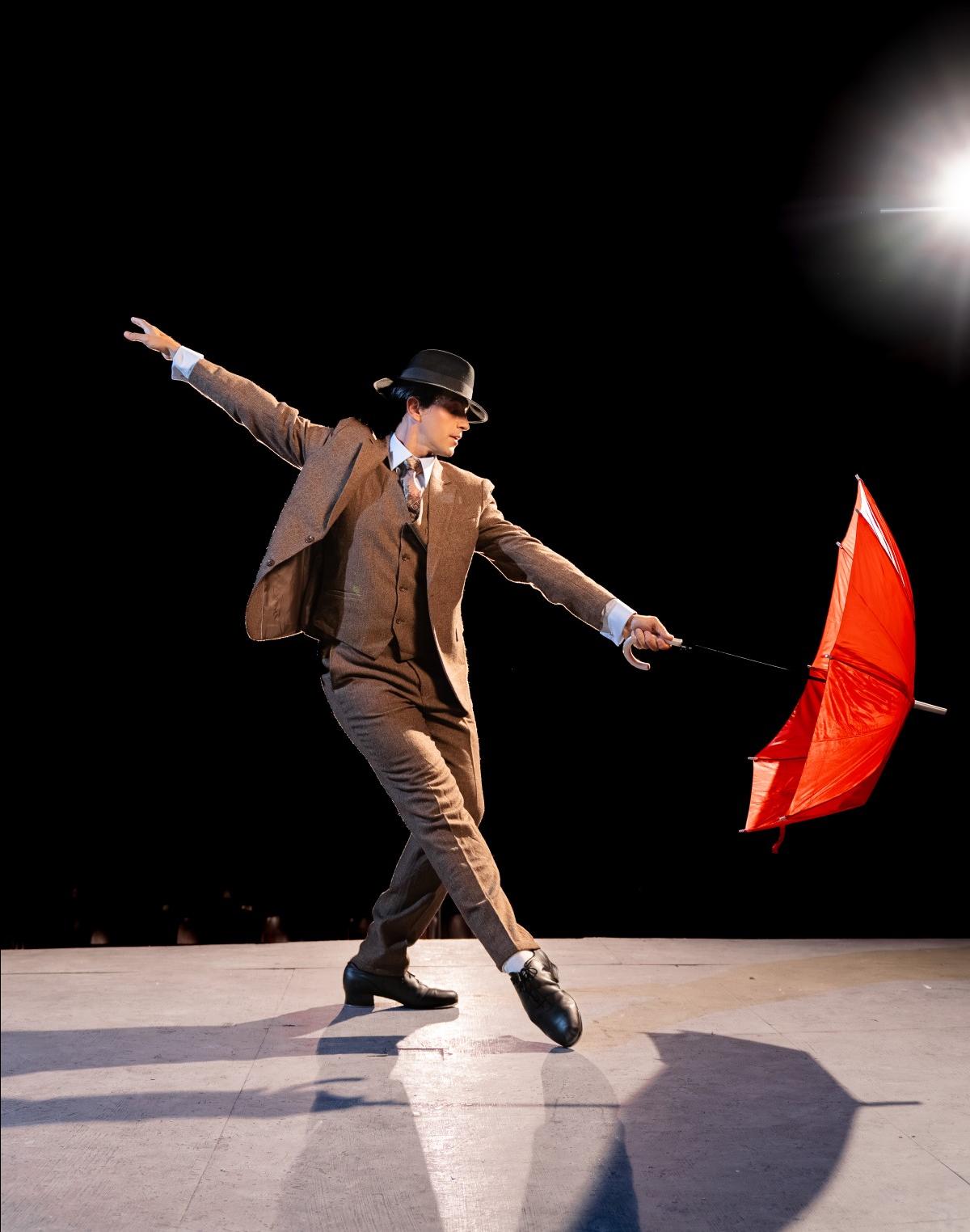 A promotional shot for <em>Singing in the Rain</em>.