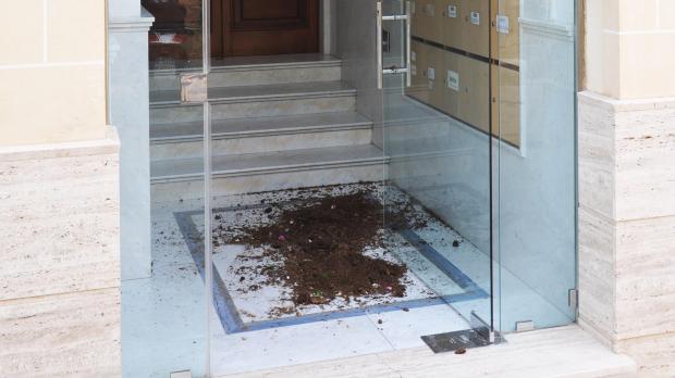 St Julian's residents are irate about soil from planters they found emptied into the common areas of their apartment block over the weekend.