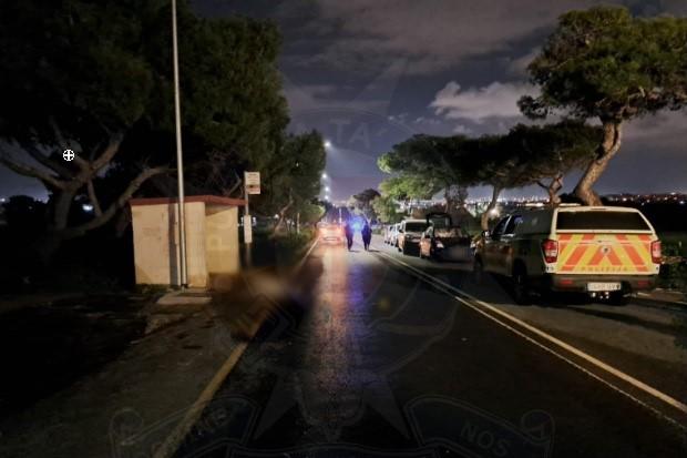 A medical team at the scene of the accident. (Police photo)