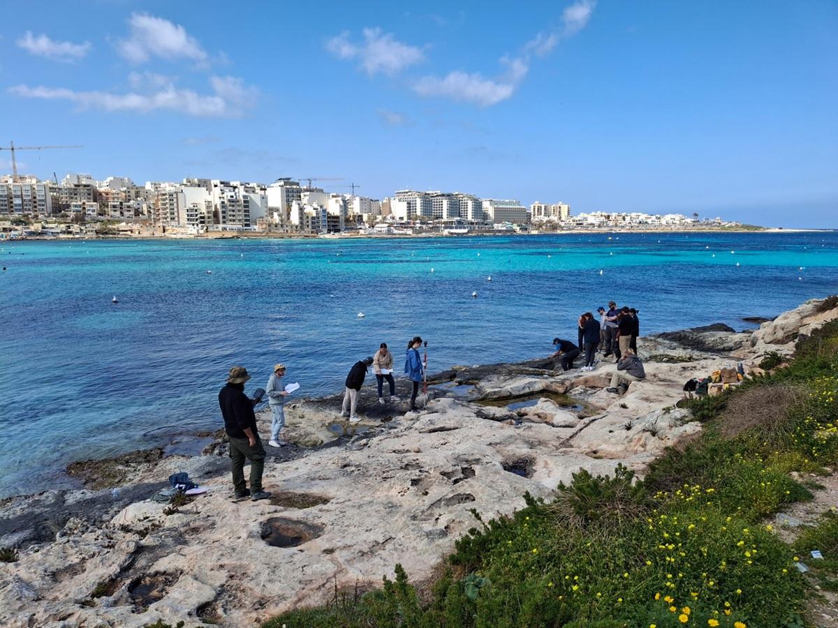 Training students in the documentation of a coastal quarry in collaboration with Heritage Malta. Photo: MA Programme in Global Maritime Archaeology.