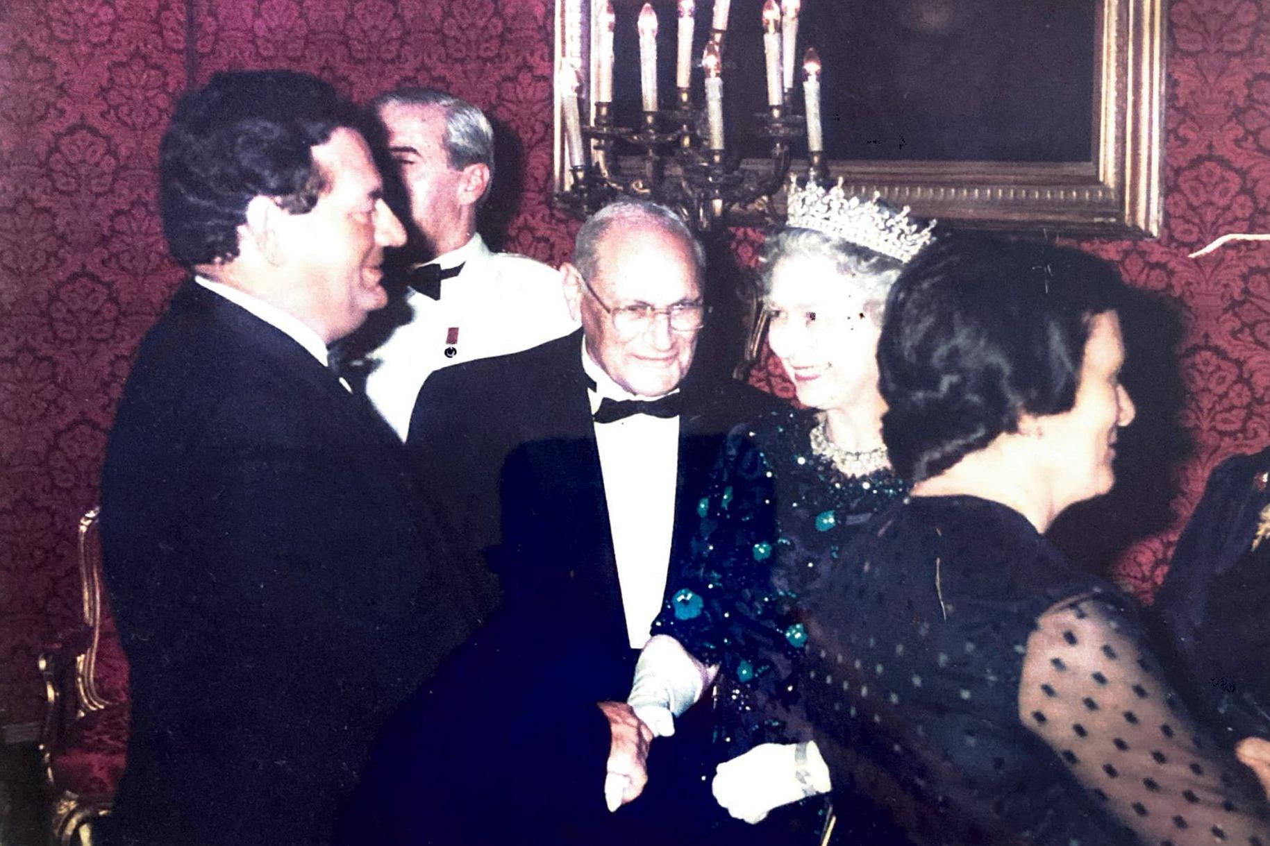 Laurence Grech (left) meeting Queen Elizabeth along with then president Censu Tabone.