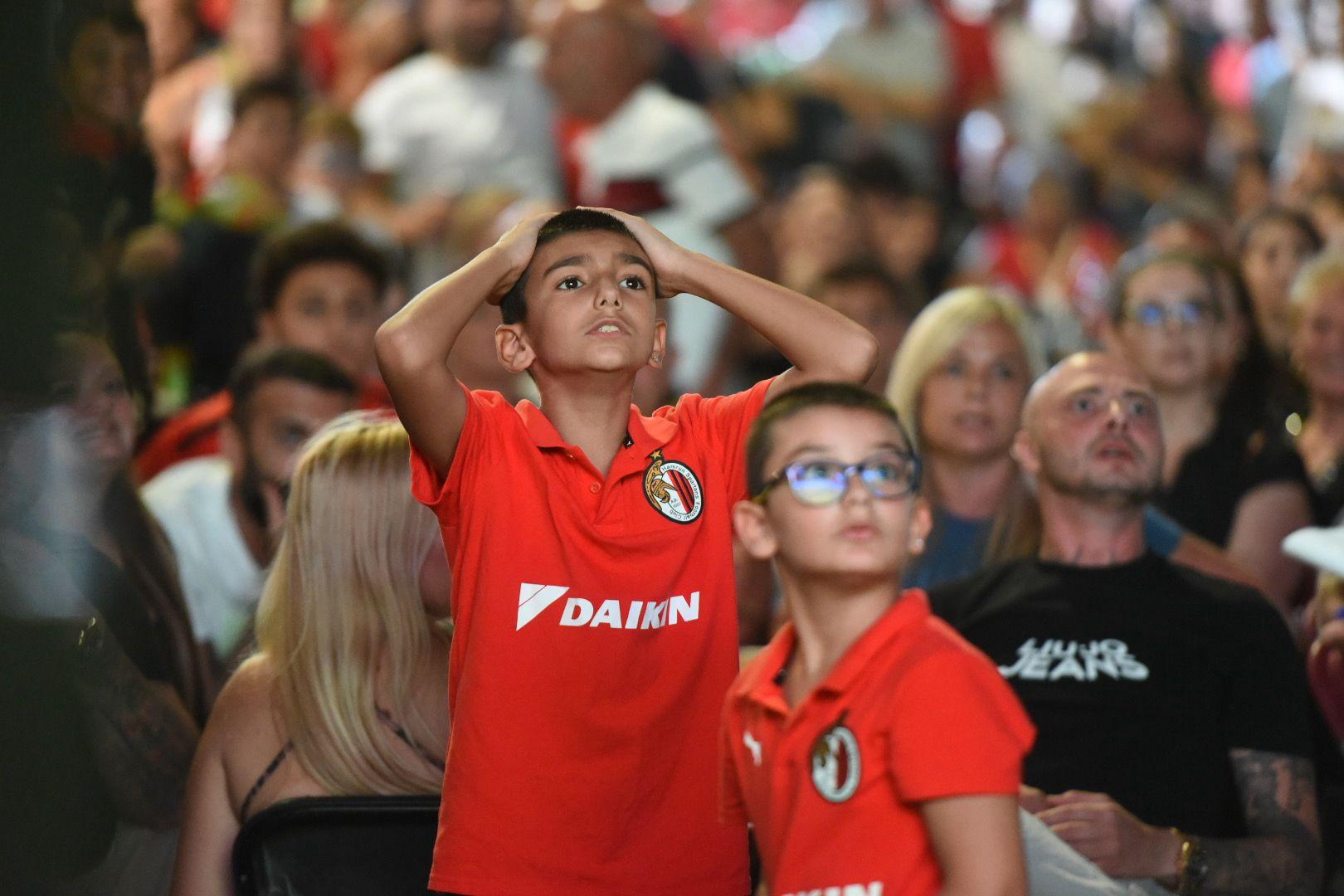 A young supporter looks on during a nail-biting moment in the match. Photo: Chris Sant Fournier.