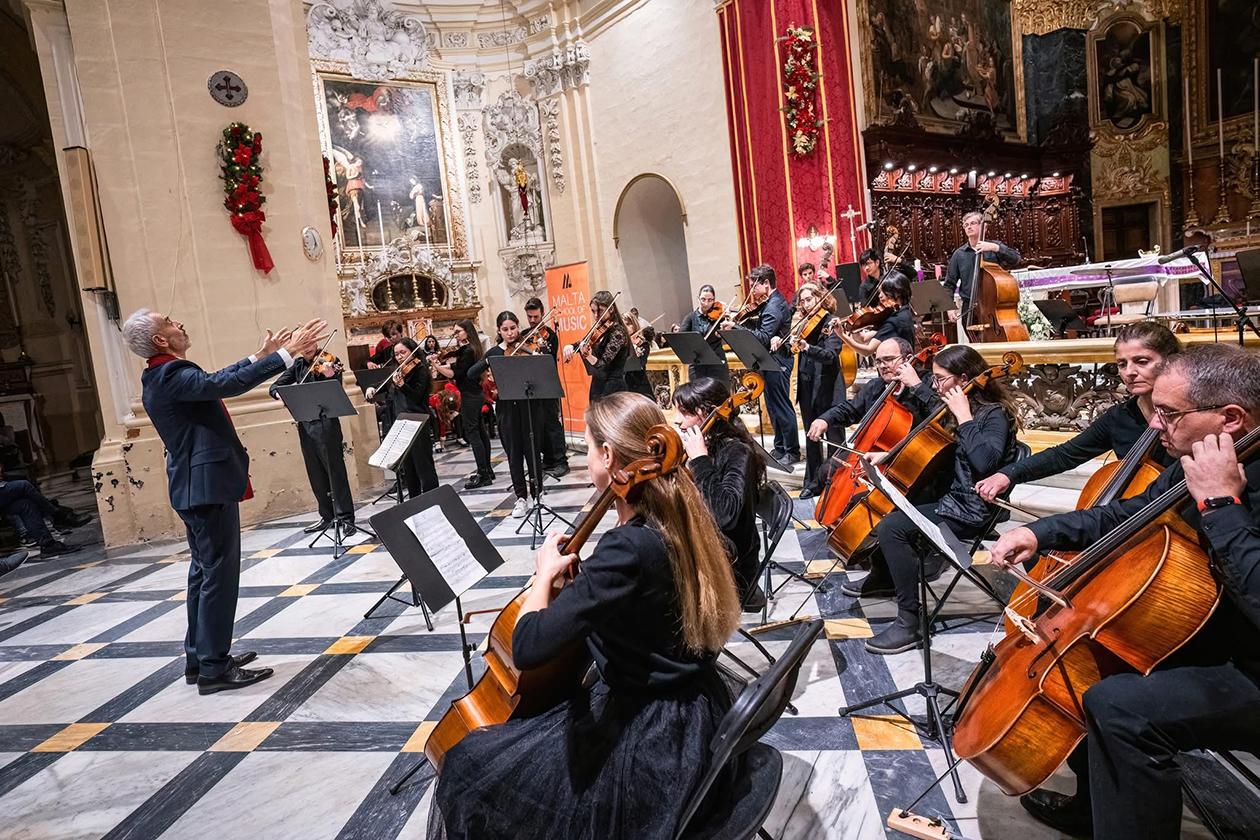 The school&rsquo;s string orchestra performing a Christmas concert led by Simon Abdilla at Senglea parish church.