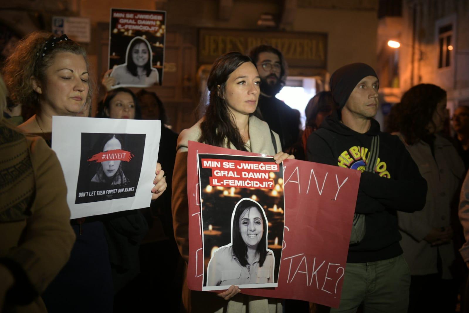 Protestors held placards with Bernice Cassar's photo on them as they marched towards Valletta. Photo:Matthew Mirabelli