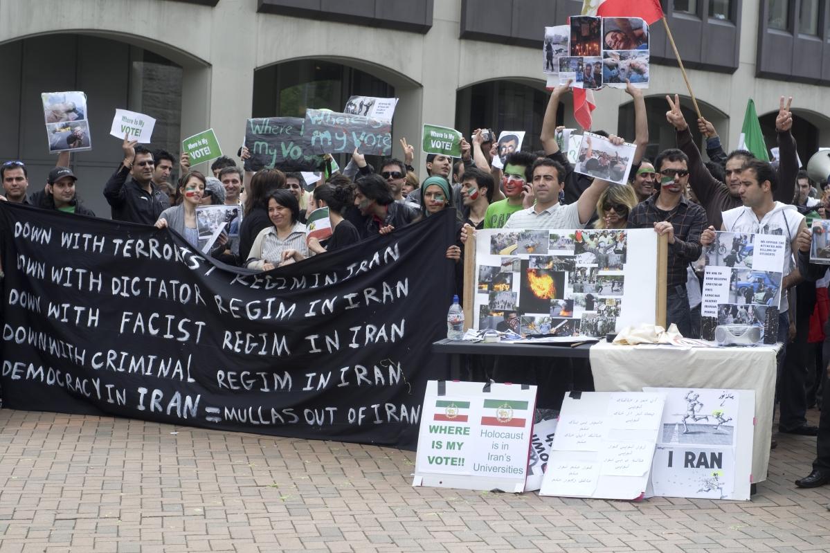UK demonstrators hold a rally protesting the results of the 2009 Iranian election. Photo: Shutterstock.