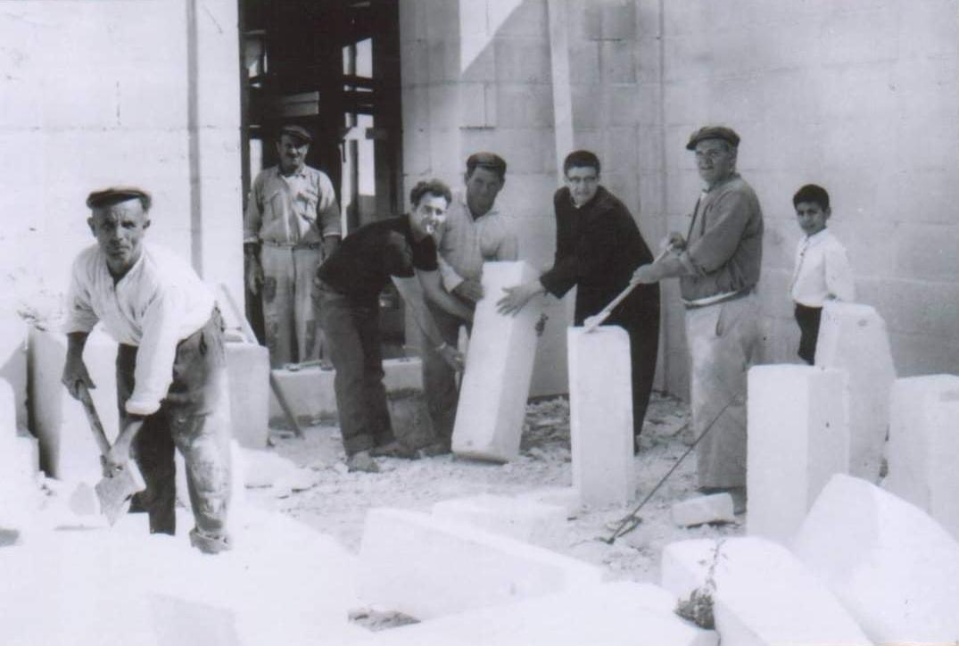 Fr Salv (third from right) during construction works at the Santa Marija ta' Bubaqra church.