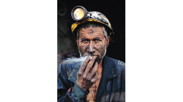 Smoking Coal Miner, Pol-e-Khomri, Afghanistan, 2002