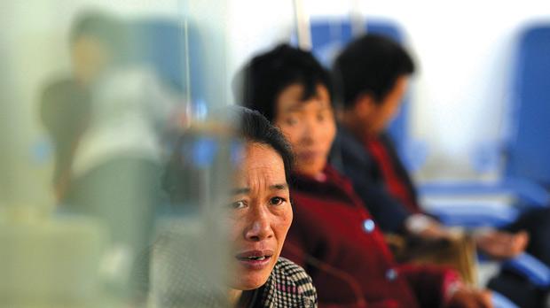 AIDS patients receiving free treatment at the Ying Zhouqu Huangzhuang AIDS treatment centre in east China.
